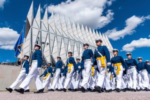 Air Force cadets marching with flags